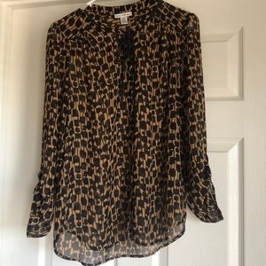 Blouse with brown and black print